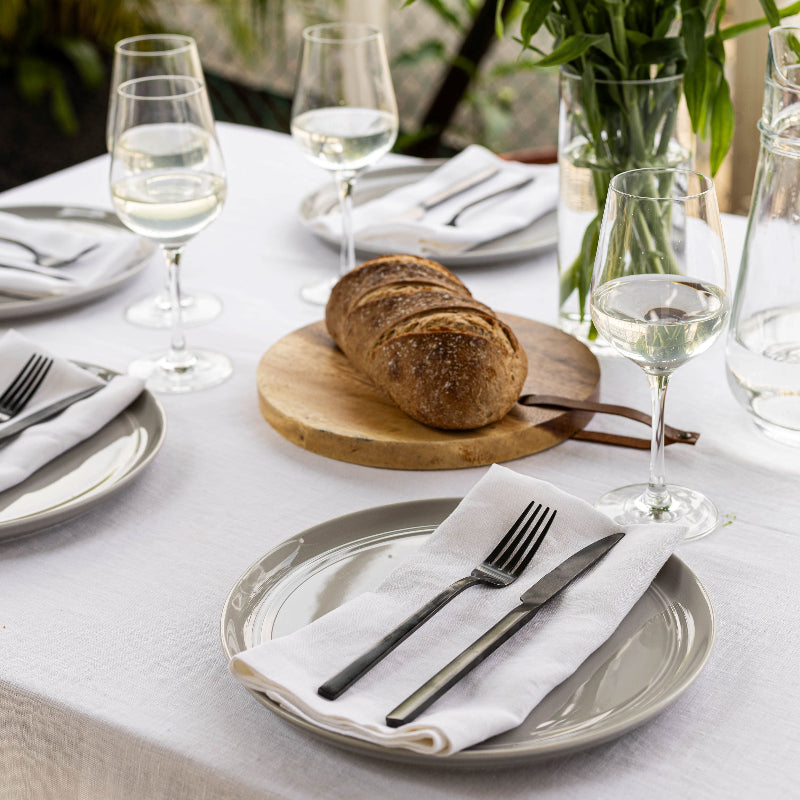 White linen tablecloth and white linen napkins