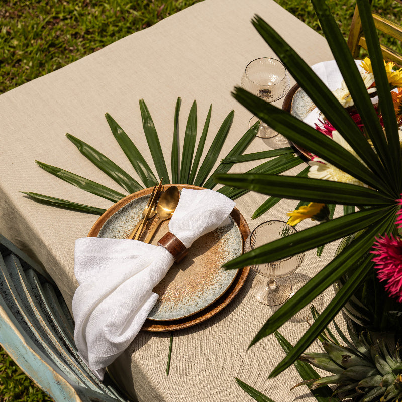 beige sand linen tablecloth and white linen napkins